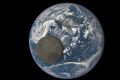 НАСА показало обратную сторону Луны на фоне Земли